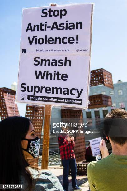 Protester holding a placard expressing her opinion, during a demonstration against Anti-Asian violence in downtown Reno as part of the national day...