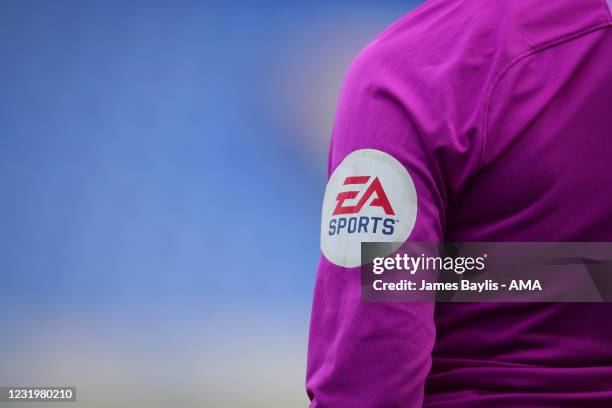 Sports sponsor logo on the shirt sleeve of the assistant referee during the Sky Bet League One match between Shrewsbury Town and Portsmouth at...