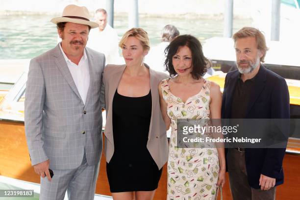 Actors John C. Reilly, Kate Winslet, writer Yasmina Reza and Christoph Waltz arrive at the "Carnage" photocall during the 68th Venice Film Festival...