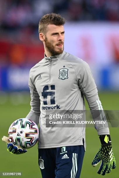 Spain's goalkeeper David De Gea warms up prior to the FIFA World Cup Qatar 2022 qualification football match Georgia v Spain in Tbilisi on March 28,...