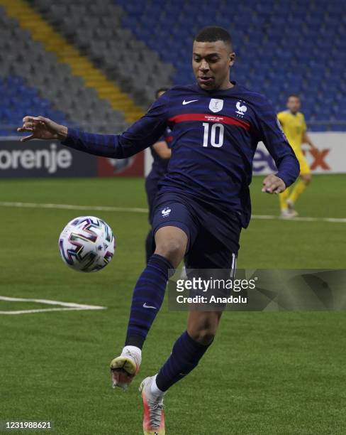 Kylian Mbappe of France in action during the FIFA World Cup Qatar 2022 qualification Group D match between Kazakhstan and France, in Nur-Sultan, on...
