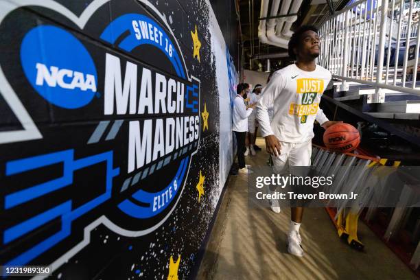 Adam Flagler of the Baylor Bears heads out to the court from the locker room before the game against Villanova Wildcats in the Sweet Sixteen round of...