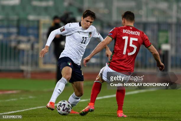 Italy's forward Federico Chiesa controls the ball during the FIFA World Cup Qatar 2022 qualification Group C football match between Bulgaria and...