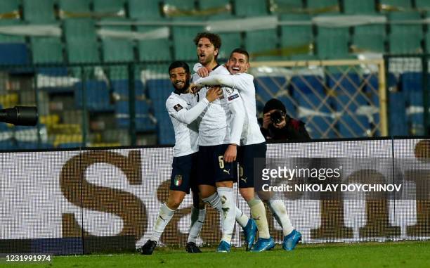 Italy's midfielder Manuel Locatelli celebrates scoring his team's second goal during the FIFA World Cup Qatar 2022 qualification football match...