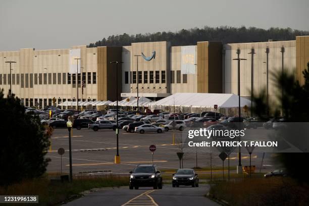 Signs reading "vote" hang outside the Amazon.com, Inc. BHM1 fulfillment center on March 28, 2021 in Bessemer, Alabama. - March 29 is the deadline for...