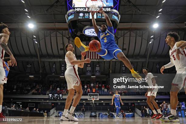 Cody Riley of the UCLA Bruins dunks against the Alabama Crimson Tide in the Sweet Sixteen round of the 2021 NCAA Division I Men's Basketball...