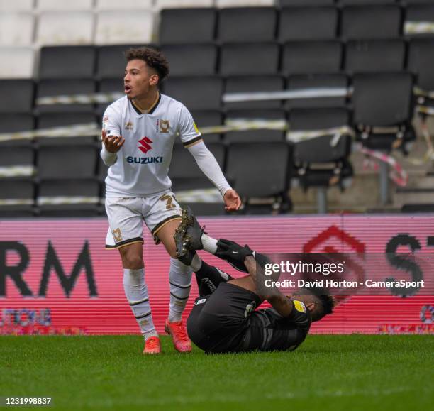 Milton Keynes Dons' Matthew Sorinola protesting about the the tackle on Doncaster Rovers' Jason Eyenga-Lokilo during the Sky Bet League One match...