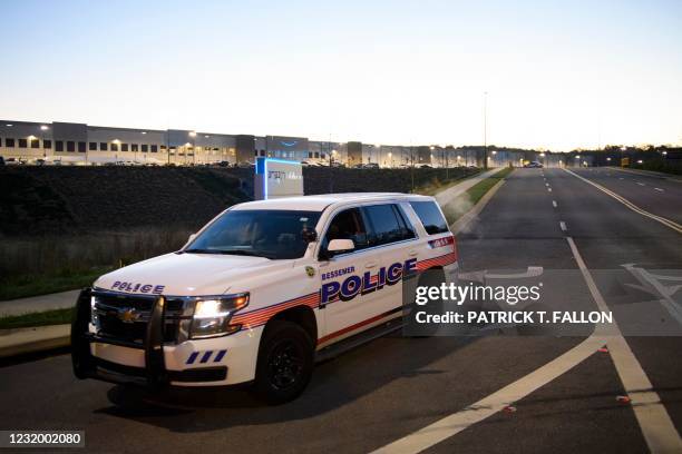 Bessemer police vehicle patrols outside the Amazon.com, Inc. BHM1 fulfillment center on March 29, 2021 in Bessemer, Alabama. - Votes are set to be...