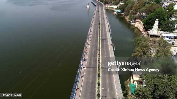 March 28, 2021 -- Aerial photo taken on March 28, 2021 shows deserted roads during lockdown in Bhopal, India. India's COVID-19 tally reached 11 624...