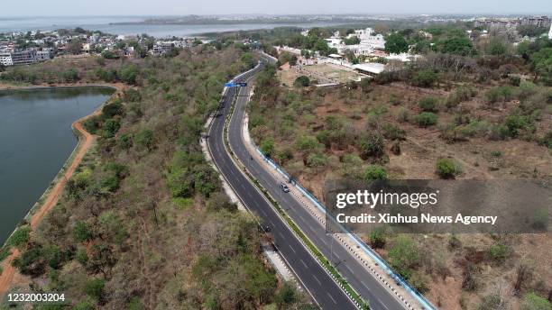 March 28, 2021 -- Aerial photo taken on March 28, 2021 shows deserted roads during lockdown in Bhopal, India. India's COVID-19 tally reached 11 624...