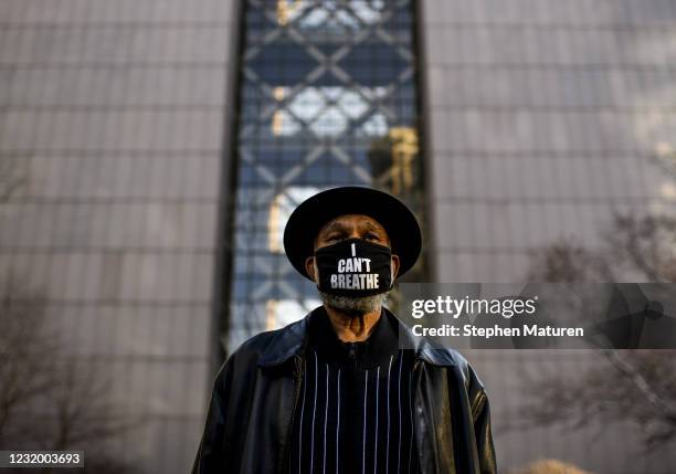 Abdul Kareem Bilal wears a mask that reads "I Can't Breathe" outside the Hennepin County Government Center on March 29, 2021 in Minneapolis,...