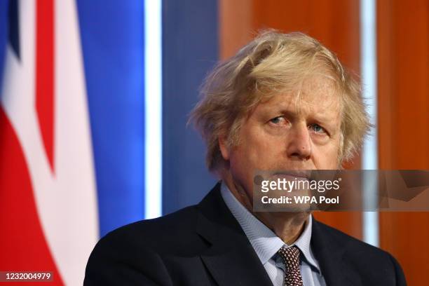Britain's Prime Minister, Boris Johnson gives an update on the coronavirus Covid-19 pandemic during a virtual press conference in the new £2.6million...