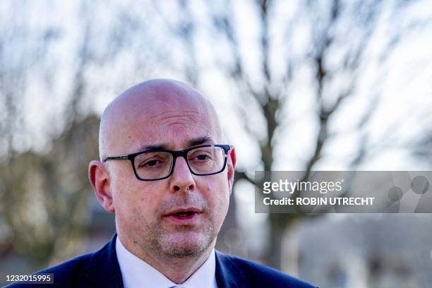 Krimpen mayor Martijn Vroom speaks to the press outside the Mieraskerk , after the church was damaged by a small explosion, on March 30, 2021. -...