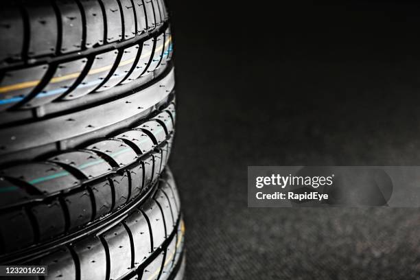 stack of tires - auto industry stock pictures, royalty-free photos & images