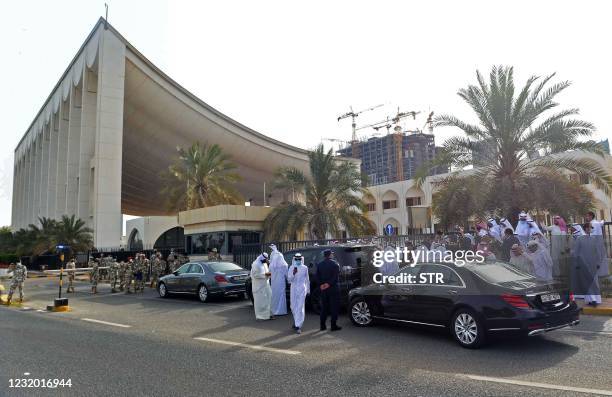 Kuwaiti opposition MPs gather outside the parliament building in Kuwait City on March 30, 2021. - Kuwait's ruler Sheikh Nawaf al-Ahmad Al-Sabah...