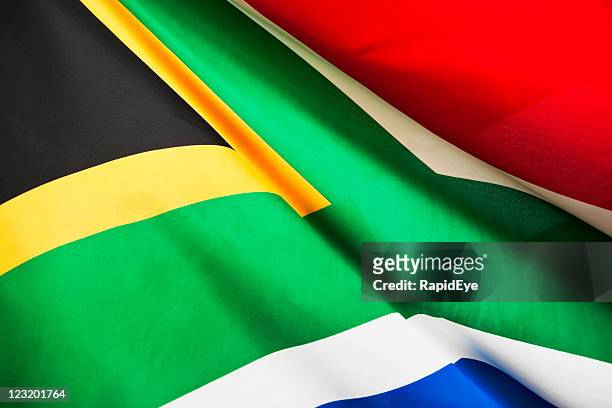south african flag billowing - south african flag stock pictures, royalty-free photos & images