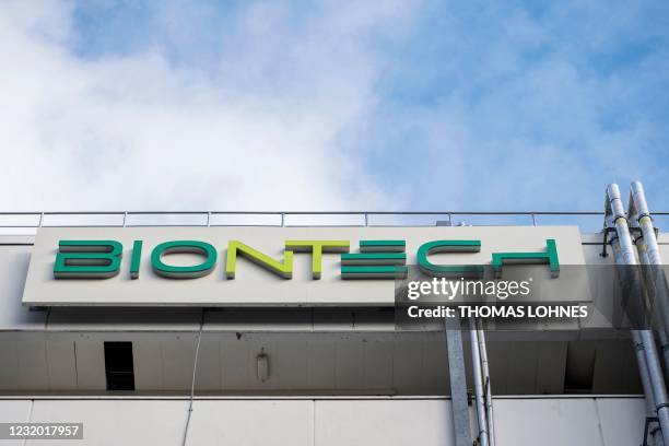 Photo taken on March 27, 2021 shows the logo on the facade of the new manufacturing site of German company BioNTech for the production of the...