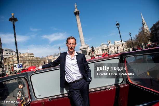 Actor and political activist, Laurence Fox, poses for photographs on top a double decker bus near Trafalgar Square as he launches his bid to become...