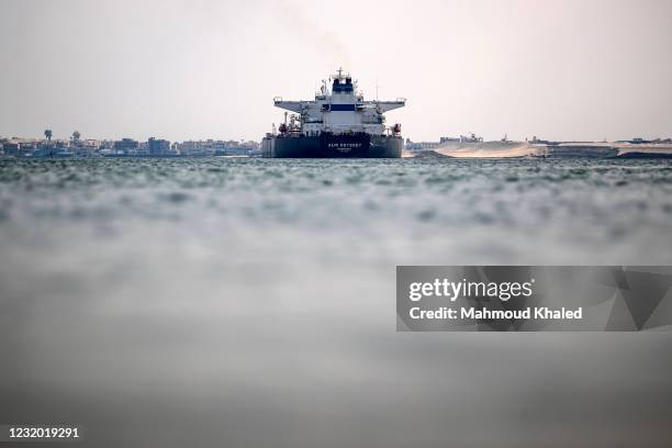 View of the ALMI ODYSSEY crossing Suez Canal on March 30, 2021 in Ismailia, Egypt. After nearly a week blocking the Suez Canal the container ship...