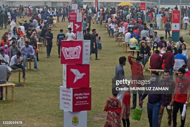 Visitors are seen during the national book fair named Ekushey Boi Mela held in Dhaka on March 30, 2021.