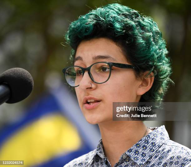 Elijah Baay, a student who is trans, speaks during a rally at the Alabama State House to draw attention to anti-transgender legislation introduced in...