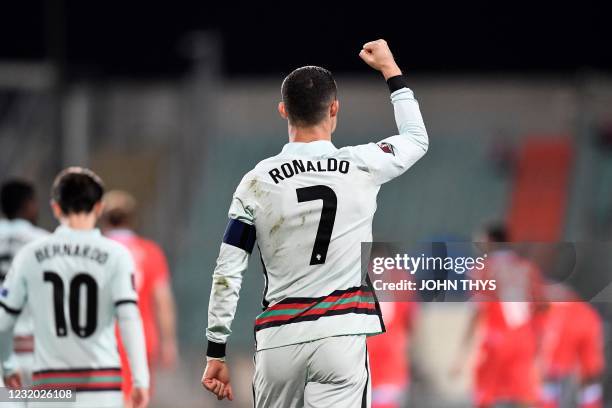 Portugal's forward Cristiano Ronaldo celebrates after scoring a goal during the FIFA World Cup Qatar 2022 qualification Group A football match...