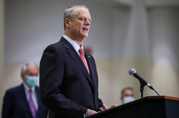 Massachusetts Governor Charlie Baker speaks to the press at the Hynes Convention Center FEMA Mass Vaccination Site on March 30, 2021 in Boston,...