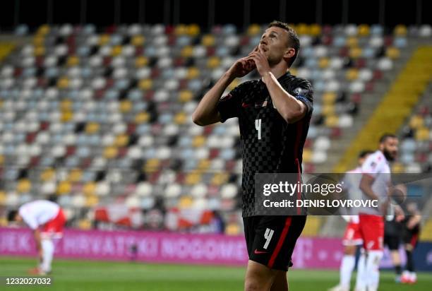 Croatia's forward Ivan Perisic celebrates after scoring a goal during qualification football match for the FIFA World Cup Qatar 2022 between Croatia...