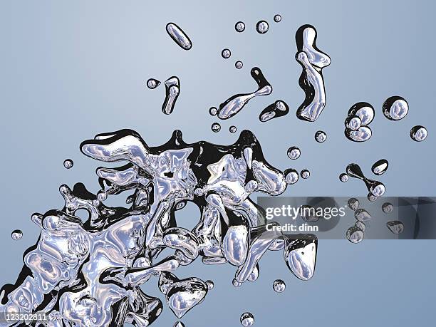 liquid splash and droplets with reflections - cr stock pictures, royalty-free photos & images