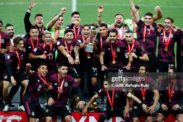 Players of Mexico lift the trophy after winning the 2020 Concacaf Men's Olympic Qualifying after the final match between Honduras and Mexico as part...