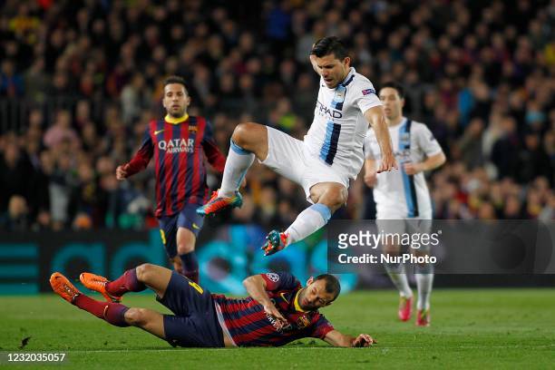Sergio Aguero of Manchester City during FC Barcelona v Manchester City UEFA Champions League- Round Of 16. Barcelona's Javier Mascherano tackles...