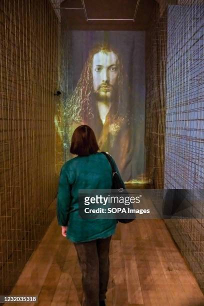 Visitor examines a projection of Dürer's image during the exhibition. "Albrecht Durer. Masterpieces of Engraving" exhibition, which includes more...