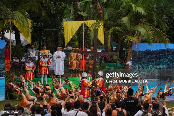 Actors perform as they re-inact the first mass on Limasawa island, southern Leyte province in the central Philippines on March 31 to mark the 500th...
