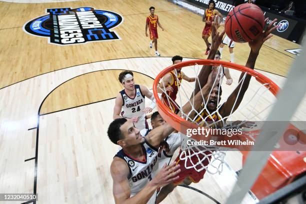 Evan Mobley of the USC Trojans shoots over Jalen Suggs of the Gonzaga Bulldogs in the Elite Eight round of the 2021 NCAA Division I Men's Basketball...