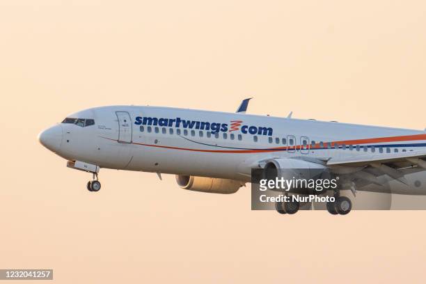 Smartwings Boeing 737-800 aircraft as seen landing at the magic golden hour during sunset time at the Dutch International airport of Eindhoven EIN...