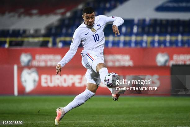 France's forward Kylian Mbappe controls the ball during the FIFA World Cup Qatar 2022 qualification Group D football match between Bosnia-Herzegovina...