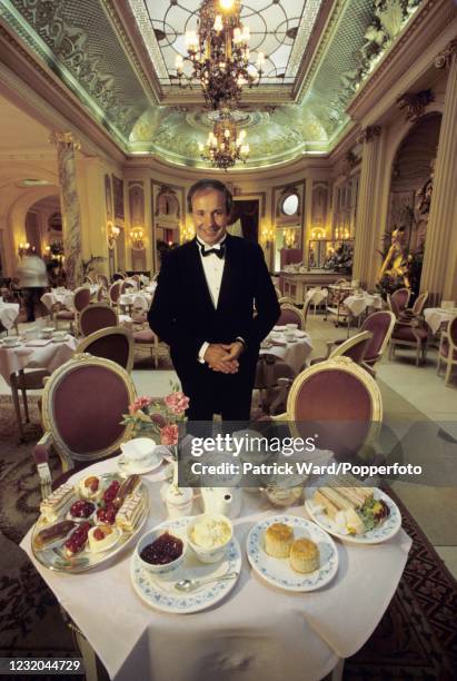 Waiter preparing to serve afternoon tea at the Ritz Hotel in London, circa September 1986.