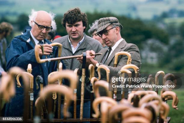 Judging the Shepherds' Crooks Competition at the Threlkeld Country Show in the Lake District, Cumbria, circa September 1990.