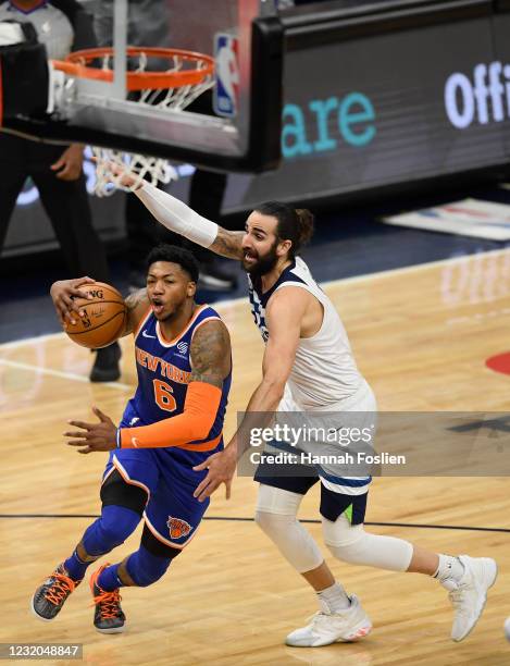 Elfrid Payton of the New York Knicks drives to the basket against Ricky Rubio of the Minnesota Timberwolves during the first quarter of the game at...