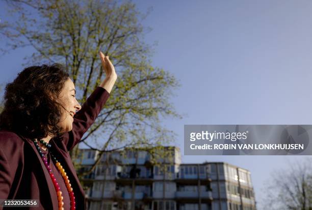 Mayor Femke Halsema of Amsterdam waves at an anniversary boat on the canal, during celebrations of 20 years of gay marriage, when the first rainbow...