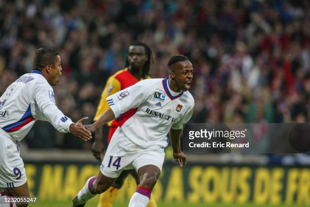 Sidney GOVOU of Lyon celebrate his goal with Sonny ANDERSON during the Division 1 match between Lyon and Lens, at Gerland Stadium, Lyon, France on...