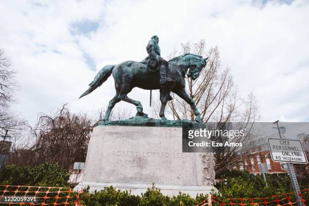 Statue of Confederate General Robert E. Lee is seen in Market Street Park on April 1, 2021 in Charlottesville, Virginia. After a five-year court...
