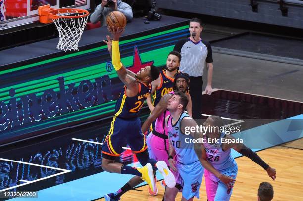 Kent Bazemore of the Golden State Warriors scores on a layup during the second half of the game against the Miami Heat at the American Airlines Arena...