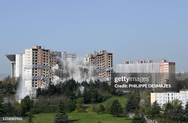 The housing building "Monmousseau" of the "ICF Habitat" is torn down through the use of pre-positioned explosives, in the popular neighbourhood of...