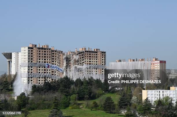 The housing building "Monmousseau" of the "ICF Habitat" is torn down through the use of pre-positioned explosives, in the popular neighbourhood of...