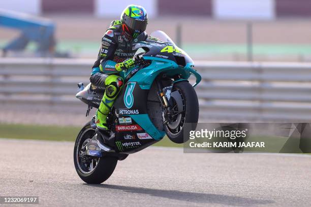 Petronas Yamaha SRT's Italian rider Valentino Rossi rides during the first free practice session ahead of the Moto GP Grand Prix of Doha at the...