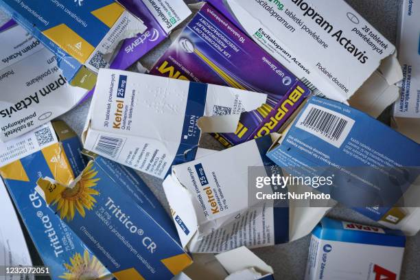 Discarded anti-depressant and painkiller medication carton paper boxes are seen in Warsaw, Poland on April 2, 2021. A report by the MarketGlass...