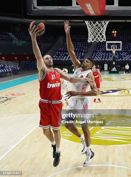 Kosta Koufos, #31 of Olympiacos Piraeus shoots the ball against Walter Tavares, #22 of Real Madrid during the 2020/2021 Turkish Airlines EuroLeague...