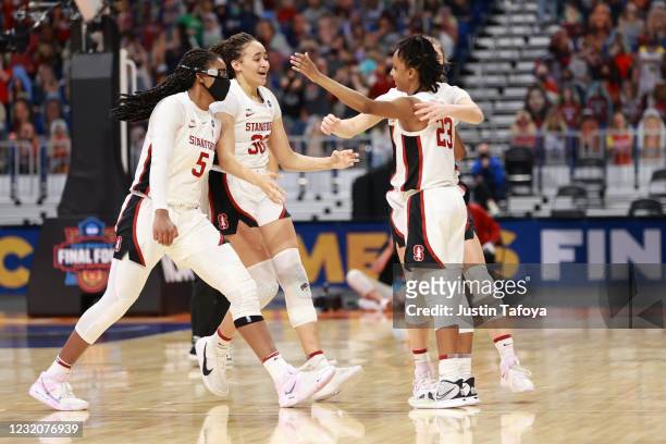 Members of the Stanford Cardinal celebrate the victory against the South Carolina Gamecocks in the semifinals of the NCAA Women's Basketball...