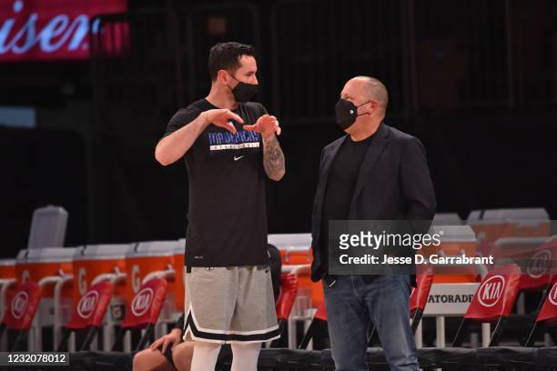 Redick of the Dallas Mavericks and New York Knicks GM, Leon Rose talk before a game on April 2, 2021 at Madison Square Garden in New York City, New...
